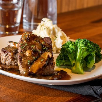 Stoney River - steak and broccoli on a plate - Steakhouses Near Me - Chesterfield, Missouri