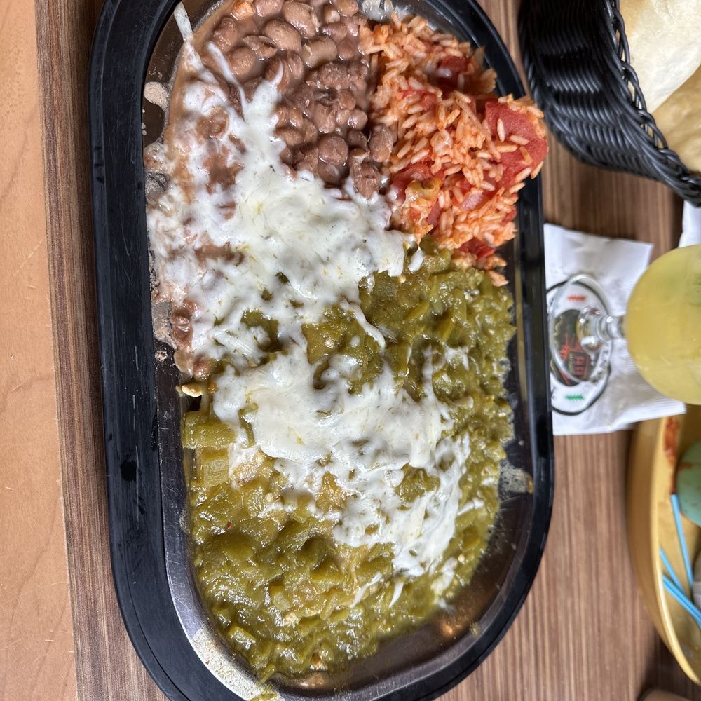 Tomasita's - Green chili chicken enchiladas - New Mexican Cuisine Near Me - Santa Fe, New Mexico Tomasita's - Green chili chicken enchiladas - New Mexican Cuisine Near Me - Santa Fe, New Mexico