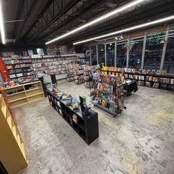 Pure Panic - Store interior view including comic wall and product shelves