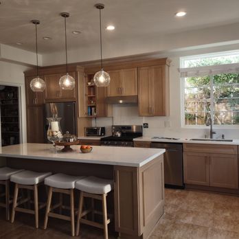 Home Solutions Kitchen Remodeling - Wanted it just like the brochure and he delivered! Custom molding on top of the cabinets and side paneling on the island - General Contractors Near Me - Oceanside, California Home Solutions Kitchen Remodeling - Wanted it just like the brochure and he delivered! Custom molding on top of the cabinets and side paneling on the island - General Contractors Near Me - Oceanside, California