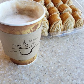 TeaPot Bakery & Cafe - Cappuccino and takeout box of gata. - Bakeries Near Me - Glendale, California TeaPot Bakery & Cafe - Cappuccino and takeout box of gata. - Bakeries Near Me - Glendale, California