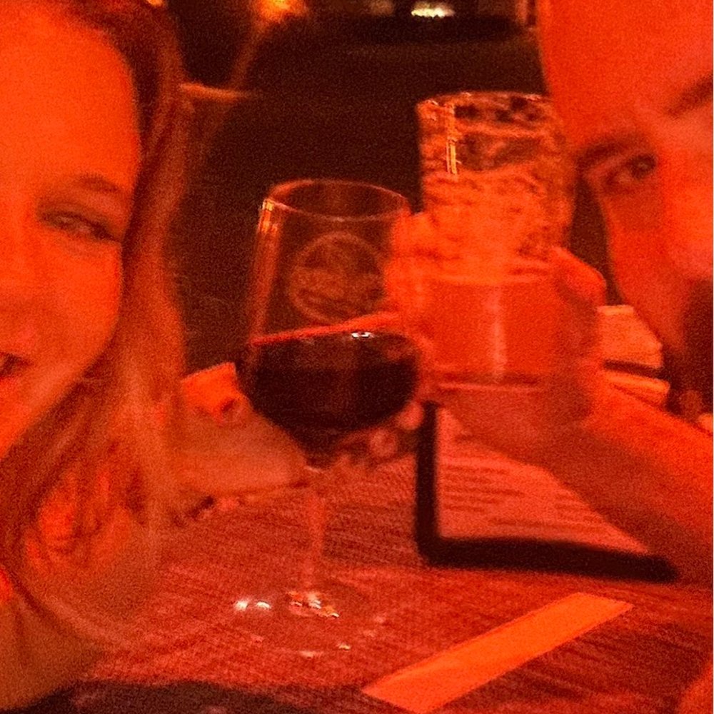 a man and a woman sitting at a table a man and a woman sitting at a table