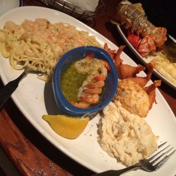 Red Lobster - Shrimp trio almost half gone in ten mins...fatty ;) - Seafood Near Me - Joliet, Illinois Red Lobster - Shrimp trio almost half gone in ten mins...fatty ;) - Seafood Near Me - Joliet, Illinois