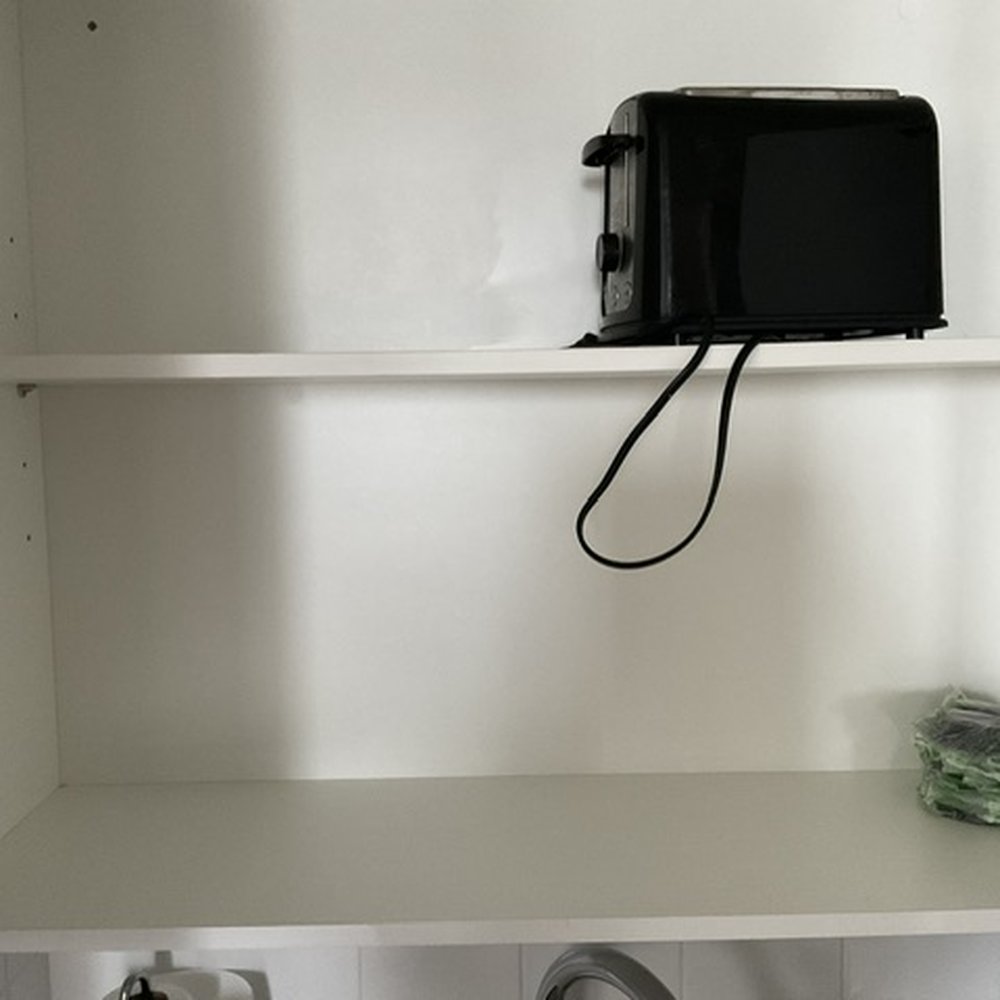 Circ Hotel - Empty kitchen cupboard - with a toaster - Hotels Near Me - Hollywood, Florida Circ Hotel - Empty kitchen cupboard - with a toaster - Hotels Near Me - Hollywood, Florida