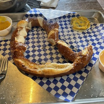 Maple Branch Craft Brewery - I forgot to take the photo before we started eating, this is the Giant Bavarian Pretzel, with Beer Cheese and yellow mustard. - Breweries Near Me - Fort Worth, Texas