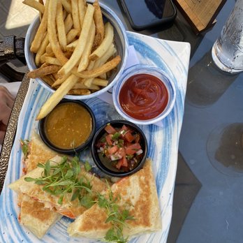 Mosaic Bar & Grille - My husband's Lobster quesadilla. This one was stuffed with Lobster - American Near Me - Laguna Beach, California