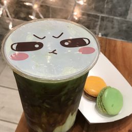 Drink: matcha black sugar boba milk (large); macaron: passion mango and pistachio