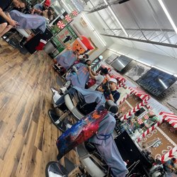 Taylor'd Made Barber Gallery - Such a great spot space and the owner makes it super festive for each holiday!