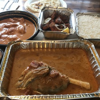 Indian Flames - a variety of food items on a table - Indian Near Me - New Tecumseth, Ontario