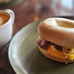 LawKew Coffee - Yummy, perfectly toasted bagel with eggs, bacon and cheese.