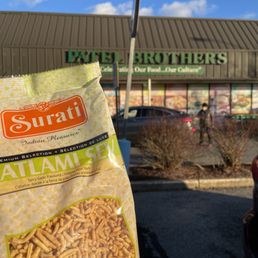 a bag of pasta in front of a store a bag of pasta in front of a store