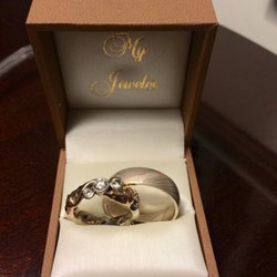 My Jeweler - Custom wedding bands:  Leaf and branch ring made in house by expert jeweler. Mokume Gane band sourced though vendor with close relationship