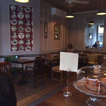 Couleur Café - Cute and casual inside with mismatched furniture and some art lining the walls - French Near Me - Brooklyn, New York Couleur Café - Cute and casual inside with mismatched furniture and some art lining the walls - French Near Me - Brooklyn, New York