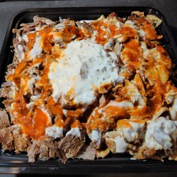 Oh My Gyro - Large signature plate with mixed beef and chicken, gyro and tzatziki sauces, extra spicy