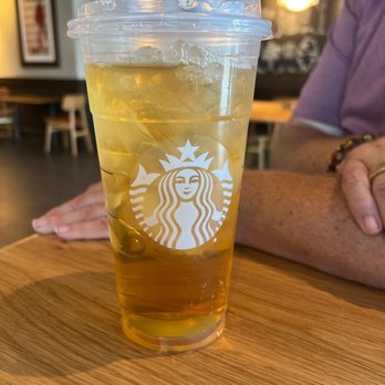 Starbucks - a glass of iced coffee on a table - Coffee & Tea Near Me - Chandler, Arizona Starbucks - a glass of iced coffee on a table - Coffee & Tea Near Me - Chandler, Arizona
