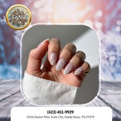 Top Nails - Winter is here and your nails need some love! Come get a fresh look for the cold season.  Book your appointment today!