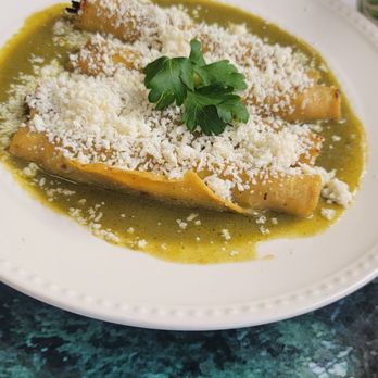 El Padrino Restaurant - Chicken flautas in their Verde mole. - Mexican Near Me - Seaside, California El Padrino Restaurant - Chicken flautas in their Verde mole. - Mexican Near Me - Seaside, California
