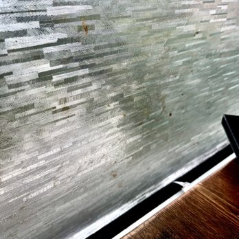 Berni Vietnamese Restaurant - Filth on window at table - Vietnamese Near Me - San Antonio, Texas