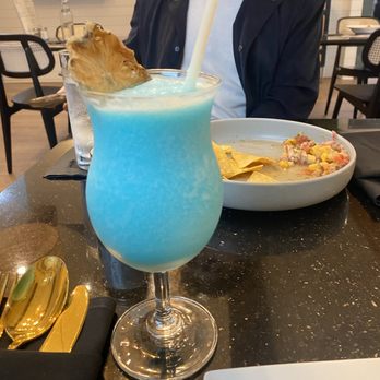 Gabriela's Seafood + Tapas - Pina colada azul - Tapas/Small Plates Near Me - Rockport, Texas Gabriela's Seafood + Tapas - Pina colada azul - Tapas/Small Plates Near Me - Rockport, Texas