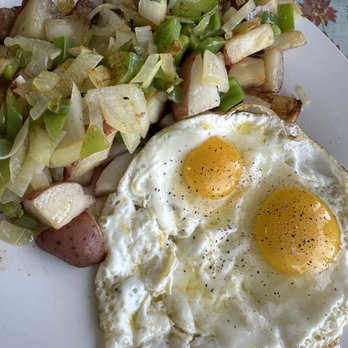 Kimmie's Coffee Cup - Two eggs Sunny side up with breakfast potatoes - Breakfast & Brunch Near Me - Cypress, California Kimmie's Coffee Cup - Two eggs Sunny side up with breakfast potatoes - Breakfast & Brunch Near Me - Cypress, California