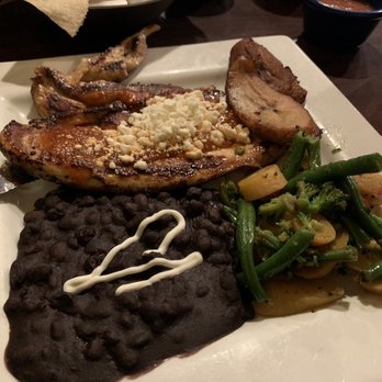 Zarate's Latin Mexican Grill - Pollo Al Rocoto with veggies inside of rice - Latin American Near Me - Edmond, Oklahoma Zarate's Latin Mexican Grill - Pollo Al Rocoto with veggies inside of rice - Latin American Near Me - Edmond, Oklahoma
