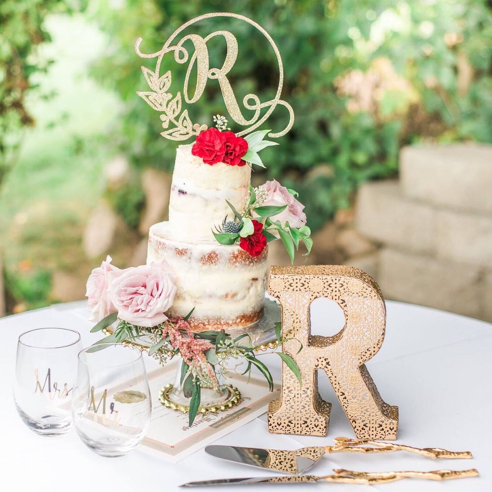 Lilac City Bakery - Two tier cake with cream cheese frosting and vanilla and huckleberry cake - Bakeries Near Me - Spokane, Washington
