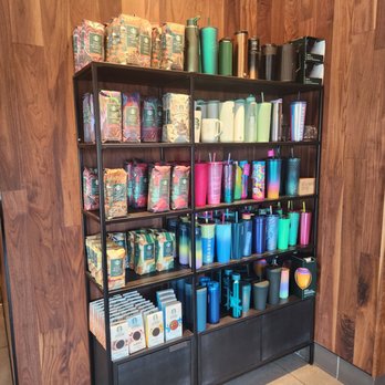 Starbucks - a shelf full of coffee cups and mugs - Coffee & Tea Near Me - Columbus, Ohio Starbucks - a shelf full of coffee cups and mugs - Coffee & Tea Near Me - Columbus, Ohio