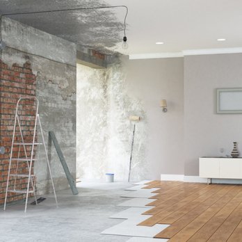 G S Custom Decks & Remodeling - a living room with a brick wall and hardwood floors - Masonry/Concrete Near Me G S Custom Decks & Remodeling - a living room with a brick wall and hardwood floors - Masonry/Concrete Near Me