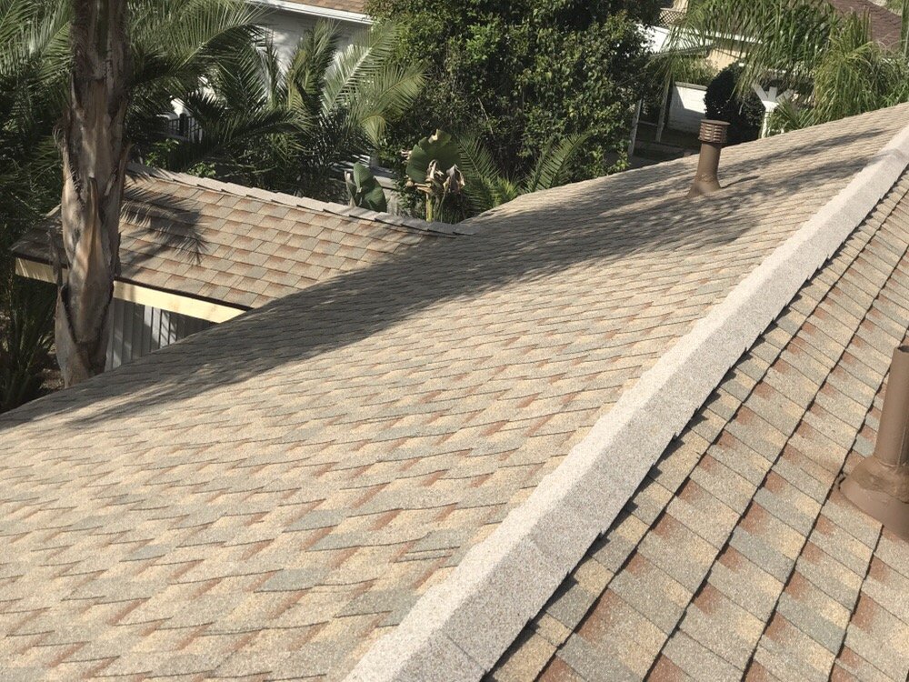 Slide of H&M ROOFING