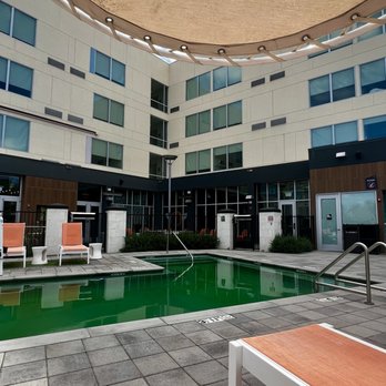 Aloft by Marriott Glendale at Westgate - Green pool without towels - Hotels Near Me - Glendale, Arizona