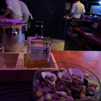 Sushi By Scratch Restaurants - Starter oyster bite. - Sushi Bars Near Me - Seattle, Washington Sushi By Scratch Restaurants - Starter oyster bite. - Sushi Bars Near Me - Seattle, Washington