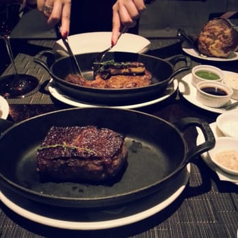 Jacobs & Co. Steakhouse - My 90 day aged PEI striploin steak...oh yeah and a NE ribeye with foie gras on it in the bg. Yum! - Steakhouses Near Me - Toronto, Ontario