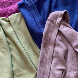 Sophie's Alteration - Photo of the hems. They said 4 times including a very heated phone call, that they hemmed the green ones.