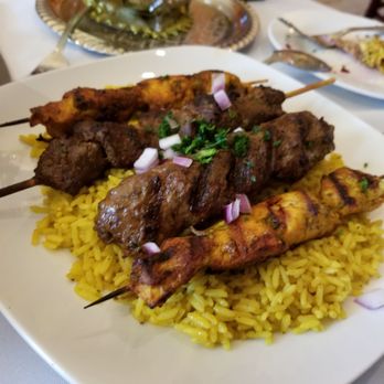 Dar Tajine - Mixed grill - chicken, lamb and ground beef kabobs over rice. - Moroccan Near Me - Plantation, Florida Dar Tajine - Mixed grill - chicken, lamb and ground beef kabobs over rice. - Moroccan Near Me - Plantation, Florida