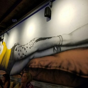 SuViche - Sushi and Ceviche - Cool art on the patio wall - Peruvian Near Me - Miami, Florida