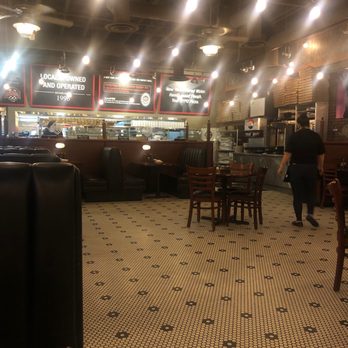 NYPD Pizza - Spacious and clean with a large window to the kitchen - Pizza Near Me - Scottsdale, Arizona NYPD Pizza - Spacious and clean with a large window to the kitchen - Pizza Near Me - Scottsdale, Arizona