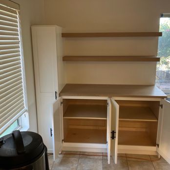 Dad the Builder - Inside view of the cabinets. Very deep. Great for small appliances that clutter the kitchen countertops - Carpenters Near Me