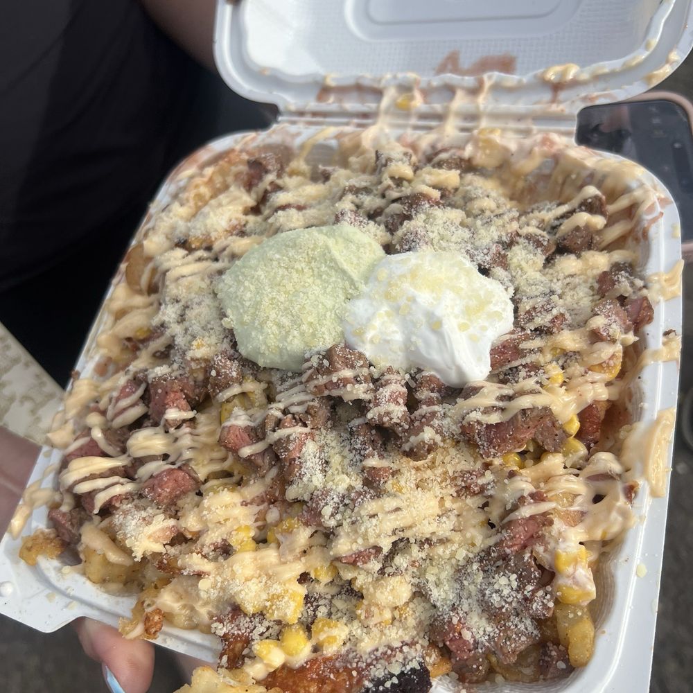 Jeramiahs - cheese skirt fries - Guamanian Near Me