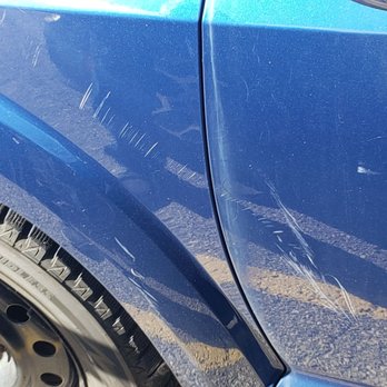 Wellington Motors - Looks like something was placed against my car and fell and scratched it.. - Body Shops Near Me - Guelph, Ontario