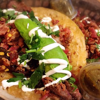 Torchy's Tacos - The Matador: chopped brisket, grilled jalapeños, pickled onions, jack cheese, avocado, sour cream & cilantro (5/5) - Tex-Mex Near Me - Cedar Park, Texas