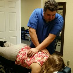Moss Chiropractic of Inverness - Inverness Chiropractor, Dr Brett Moss, adjusting  patient.
