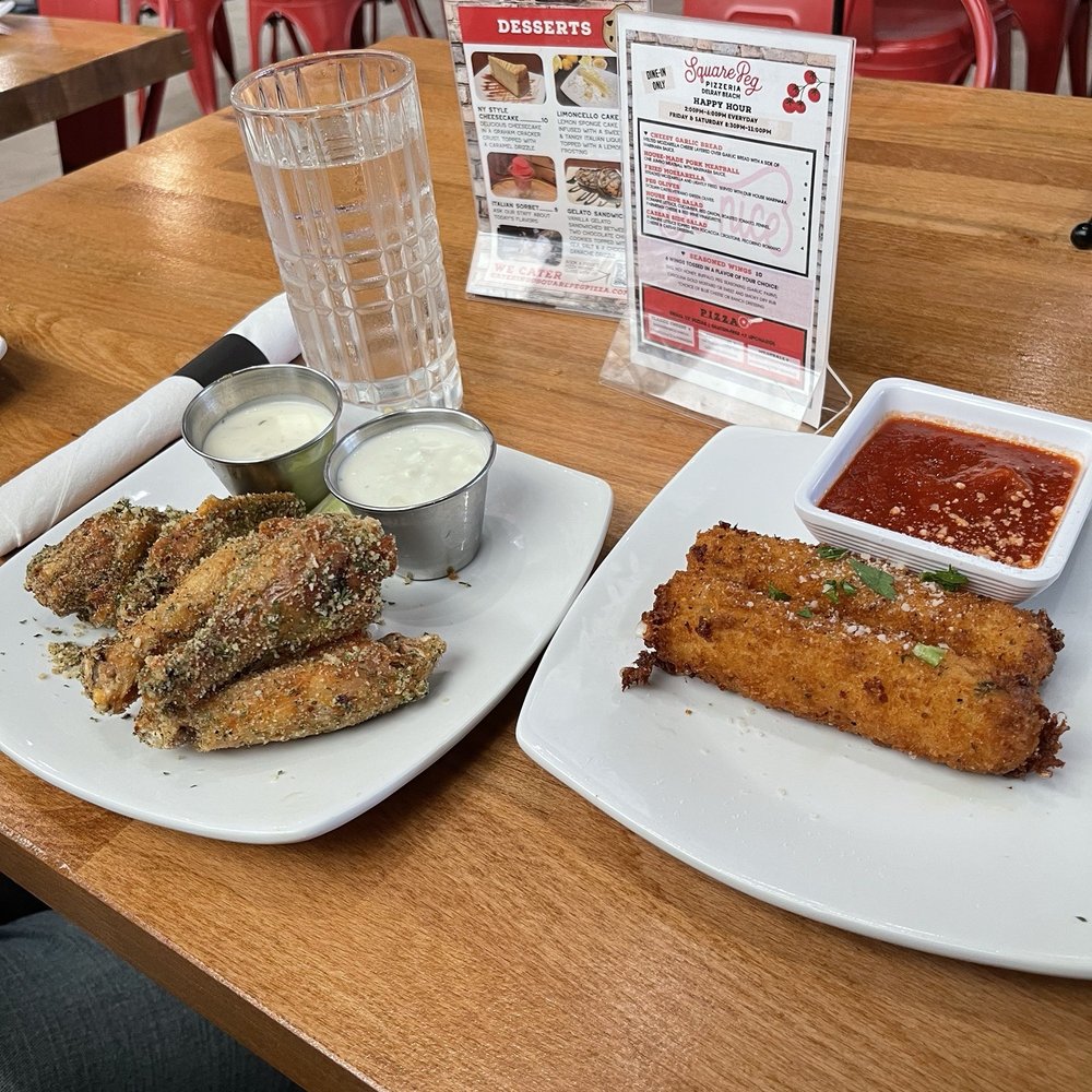 Square Peg Pizzeria - Chicken wings with Square Peg seasoning  Mozzerella Sticks - Pizza Near Me - Delray Beach, Florida