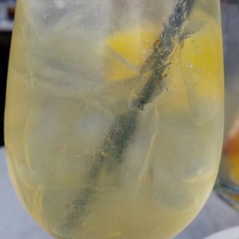 Earls Kitchen + Bar - White sangria. - New American Near Me - Miami, Florida Earls Kitchen + Bar - White sangria. - New American Near Me - Miami, Florida