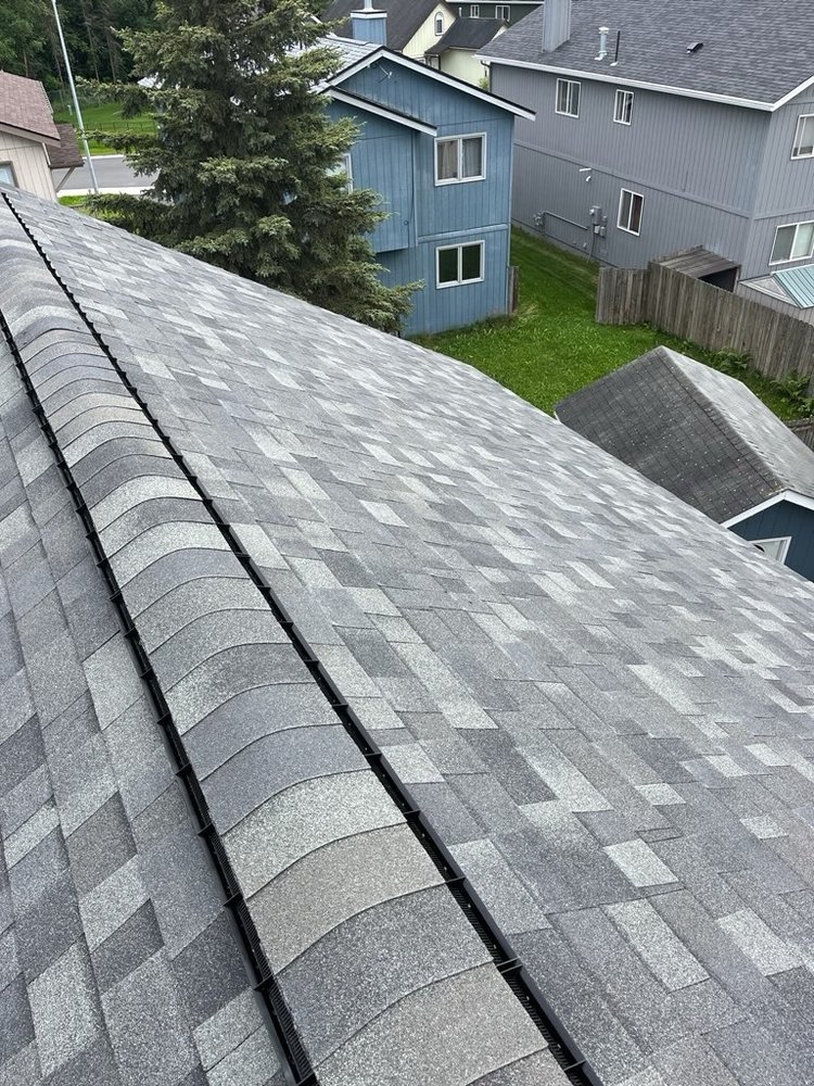 Slide of Harris Roofing