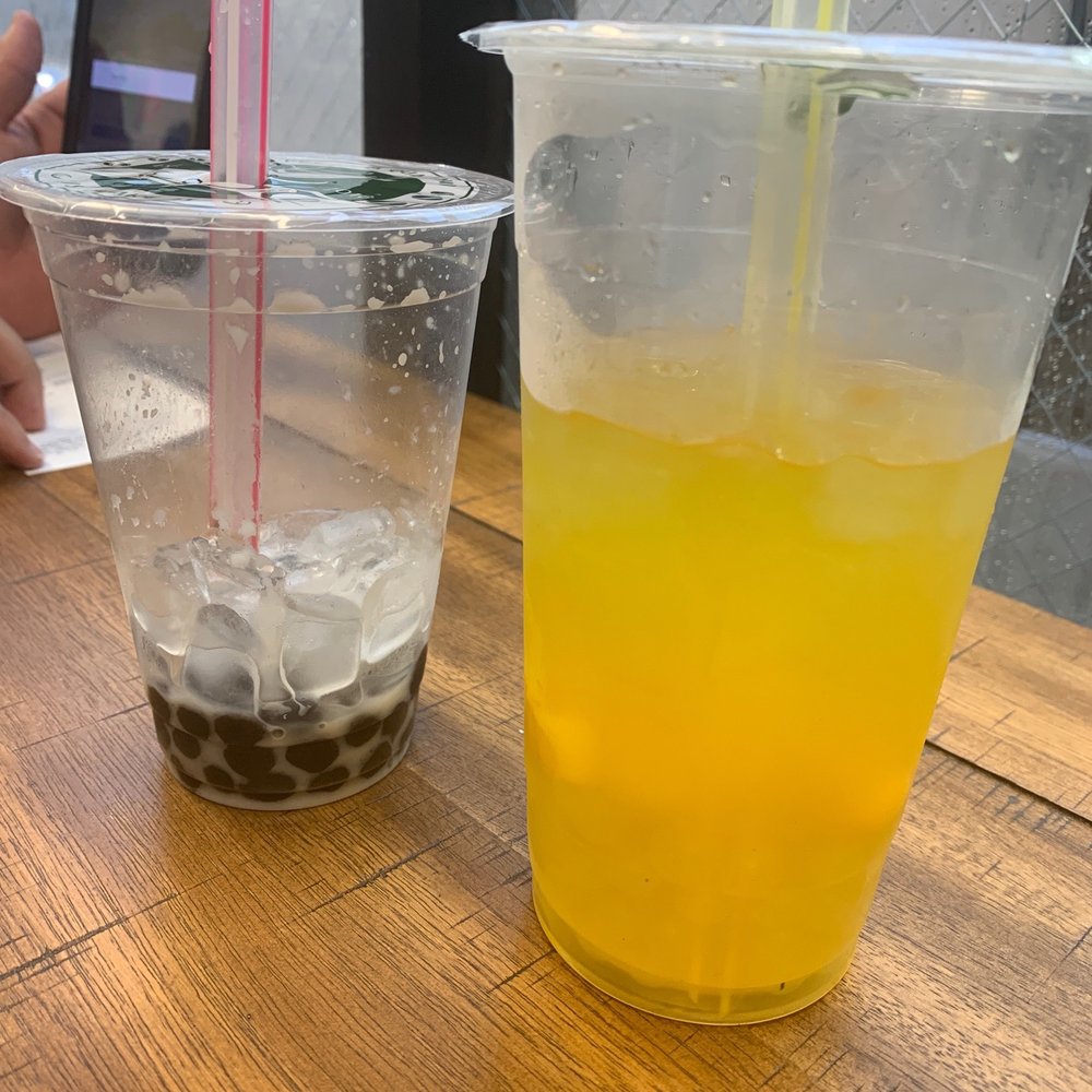 TeaJito - Finished taro tea with honey boba and half a large mango green tea with popping lychee boba - Bubble Tea Near Me - Miami, Florida TeaJito - Finished taro tea with honey boba and half a large mango green tea with popping lychee boba - Bubble Tea Near Me - Miami, Florida