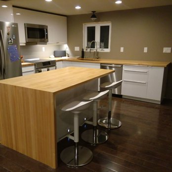 Sprague Woodworking - Waterfall edge island - maple butcher block - Kitchen Supplies Near Me - Harvard, Massachusetts