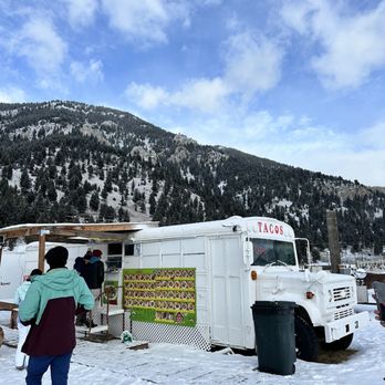 Mi Pueblito Taco Bus - people standing in the snow - Tacos Near Me - Big Sky, Montana Mi Pueblito Taco Bus - people standing in the snow - Tacos Near Me - Big Sky, Montana