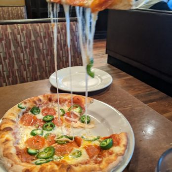 Russo's New York Pizzeria Conroe - The cheese stretch! - Italian Near Me - Conroe, Texas Russo's New York Pizzeria Conroe - The cheese stretch! - Italian Near Me - Conroe, Texas