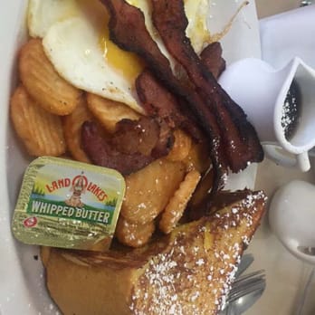 Bear Paw Cafe - Vanilla brûlée French toast with sunny side eggs, home fries and crispy bacon. - Coffee & Tea Near Me - St. George, Utah Bear Paw Cafe - Vanilla brûlée French toast with sunny side eggs, home fries and crispy bacon. - Coffee & Tea Near Me - St. George, Utah