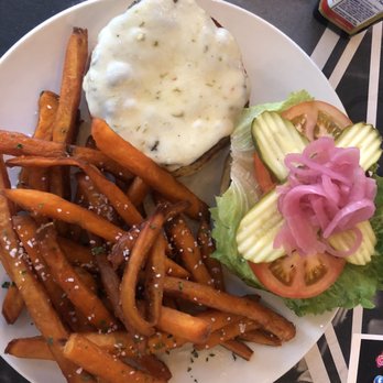 Murphy’s Corner - Burger and sweet potato fries beautifully plated. - New American Near Me - Lenexa, Kansas